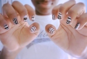 Black and white tribal print nails done with white nail polish and black acrylic paint 💀💅