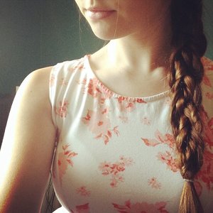 Three plaits braided into one at the side of the head. 