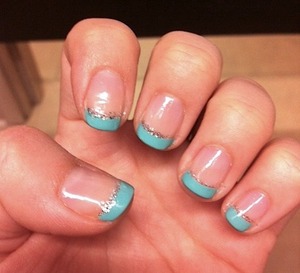 Basic clear polish with Tiffany blue tips and some silver glitter for some added glam!