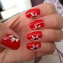 Red and white flower nails 