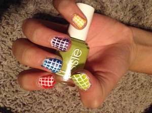 Hey everyone! Try this adorable nail design using striping tape and 5 of your favorite nail colors!  