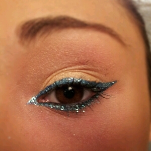 I'm not much of a makeup artist but I felt artsy with my eyeliner and glitter one day...