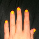 Yellow nails with hot pink tip