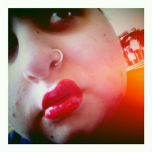 Challenge day 3: Glossy, this is me with lime crime's candy apple carousel lip gloss. 