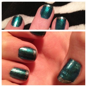 Teal with silver tips and a black dotted underline.. 