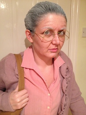Dressed up as a granny for a NYE fancy dress party! I didn't apply any foundation or concealer underneath as I wanted any imperfections and pigmentation to show. Products used:
• Ben Nye Cake Liner in dark brown - for the wrinkles
• NYX Powder Blush in Taupe - to add contouring
• MAC eyeshadows in Blackberry and Goldenrod - to add discolouration
• Random white face paint - combed into the brows with an old mascara wand
• Graftobian hi-def glamour creme corrector palette - used the extra hi lite to highlight right next to some of the contouring
• White hairspray you can get from a joke shop - used this to spray my hair white! 

Hope you enjoy!