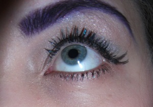 Purple shadow on brows and the Prrrowl mascara from Benefit 