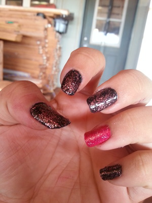 black shimmer with a pink glitter coat && a bright pink with a pink glitter coat