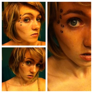 My attempt to a cheetah and dirt smudged "jungle woman" look. 