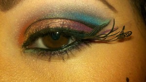 Colorful and playful eye using paper lashes with a dark cut crease