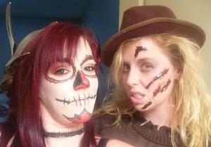 Sugar skull makeup on me and the ripper makeup on my gf for halloween last year....makeup and hair by me on both!