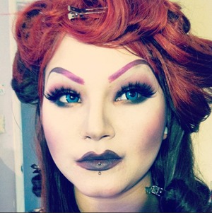 This is a look I did with bright blue contact lenses, a wig (Hollywood SIS Wig - Style: Legacy, Color: Red with Brown underneath but I forget the color number!) 