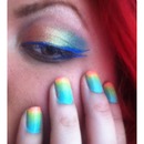Rainbow eyes and nails. 