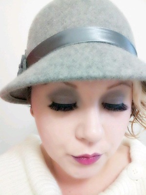 I do love a good cloche. Softer take on flapper makeup.