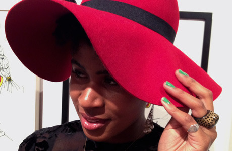 Laurice gives a hint of holiday cheer by pairing her Essie Mojito manicure with a wonderful red winter hat.