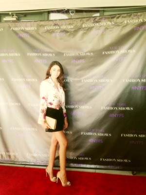 I was on the red carpet for Michael Costello I am wearing a Ted baker rumper and my shoes are miu miu 