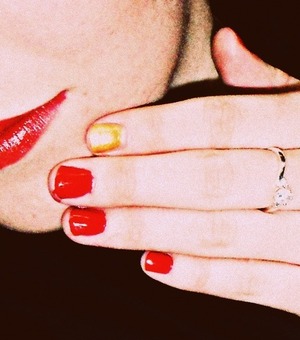 one odd nail, red + gold.