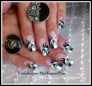 BLACK AND WHITE ABSTRACT NAIL ART DESIGN TUTORIAL. https://www.youtube.com/watch?v=_g8Hrao4RoM