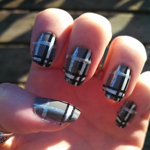 black, white, and silver plaid design over a gray base