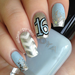 Yesterday (August 16th) was my 16th birthday! I decided to do my nails with all of my favorite polishes and designs. I used Zoya "Blu" which is my favorite light blue creme (and my favorite color is light blue!), Revlon "Silver Dollar", and Essie "Set in Stones"! I did some chevrons, of course, and I also did a glitter gradient which is something I have been loving lately! I outlined the 16 with black acrylic paint.