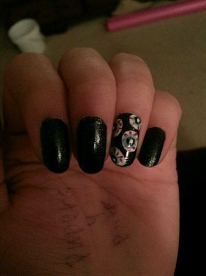 Eyeballs on my nails. It gives even a girly outfit a bit if edge 