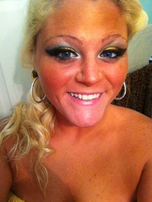 Makeup done by me for my cousins wedding, black, gold, and a hint of silver and white. :)