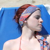 Red hair by the pool