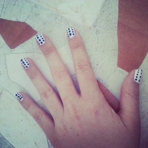just white and black polish and then dotting :) 
