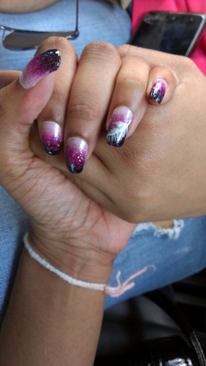 ombre nails with a feather design