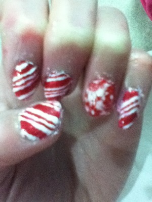 Candy cane nailart with ringmaster dipped in real hand crushed peppermint      Fun to look at not to eat