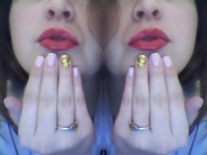 I painted my nails a pastel pink with an accent of gold glitter. Then dazzled it up with a classic red lip.