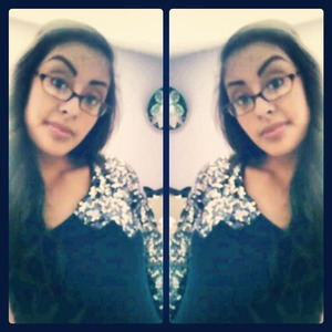 Brown eyes and long brown hair.