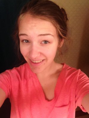 My hair in a bun, I just woke up so no makeup! 😁😳