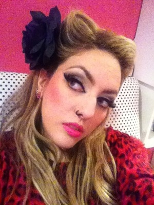Makeup and victory rolls , modern pin up