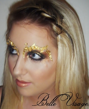 Smoky bronze/black/gold eye with gold leaf eyebrows and loads of black mascara 