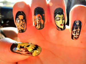 Disney Villains Nails: Left Hand 

Acrylic self hand painted nails, natural nails used.

I lost all of my pictures of my left hand Disney Villians Series, but luckily there are a lot of people who took pictures! (And with a nicer camera)

DISNEYMATION NAILS - disneynails.tumblr.com