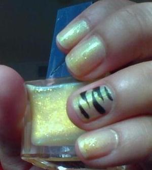Yellow Tiger Nails