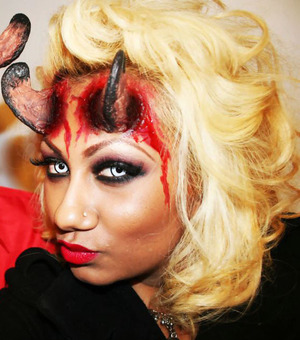 I made these horns out of household items for my Halloween costume this year! Got some fake blood, crazy contacts, Smokey eyes & a Blood Red lipstick and viola....halloween 2011!