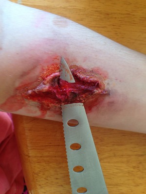 Amazing what a little latex and fake blood can do..