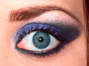 Used MAC's "My Dark Magic" from the Venomous Villains Collection.
