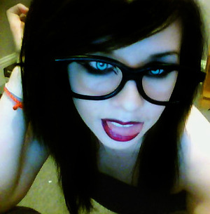 Geeky glasses/Cat eyeliner and dark red lips - SEXY!