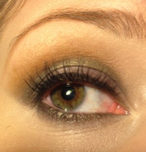 Using shadows from the Balm's "Balm Jovi" palette

-"Adagio" on the brow bone and inner corner
-"Allegro" in the crease and blended up towards the brow
-"rem" on the lid
-"Lead Zepplin" in the crease and along the lower lashline
-"Iron Maid-in" on the inner corner and onto inner third of the eyelid
-"The Stroke" to line the upper lid
