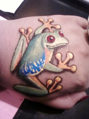 Red Eyed Tree Frog done on my hand in all eye shadow and liquid medium.