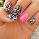 Hot pink accent nail.