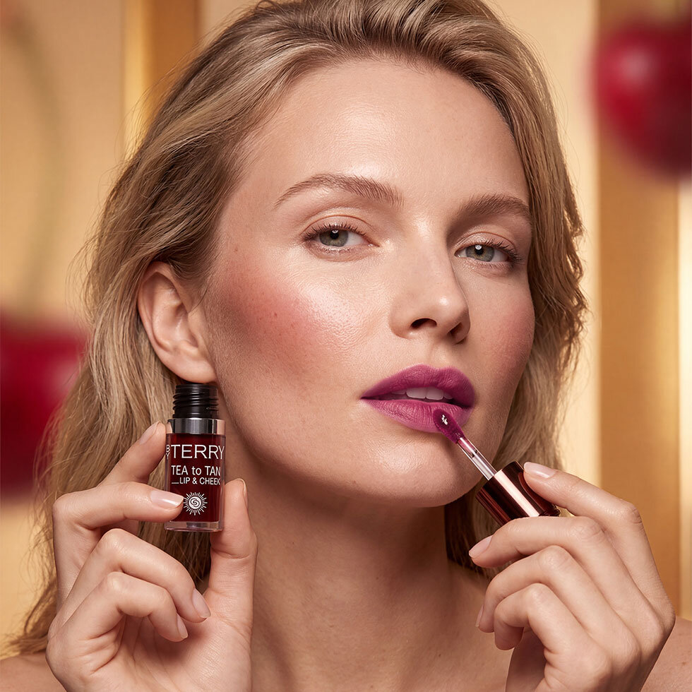 BY TERRY model using the Tea to Tan Lip & Cheek