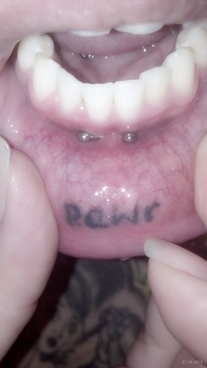 I have so many piercings in my mouth, but I love every one! I need to get my tattoo touched up, it's so faded :(