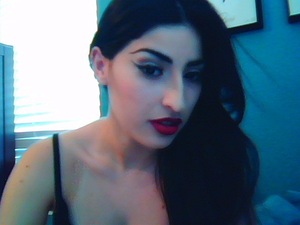 Lady Gaga Telephone look with ruby red lipstick & tons of liquid eyeliner.