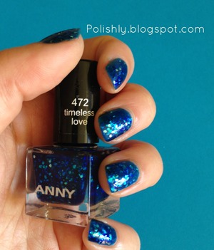 Gorgeous silver and aqua hex glitter in a blue jelly base. This photo is just two coats!