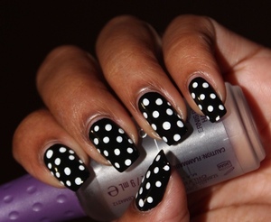The classic black with white polka dots. For more info: http://www.bellezzabee.com/2012/09/nail-challenge-day-7-classic-black-and.html