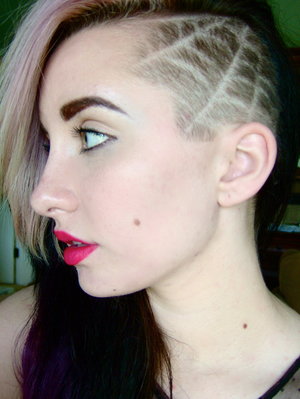 My fellow cosmetology school friend helped me get pumped for halloween with this sideshave spiderweb